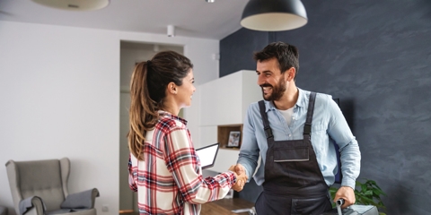 man and woman shaking hands