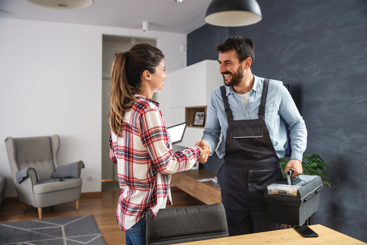 man and woman shaking hands